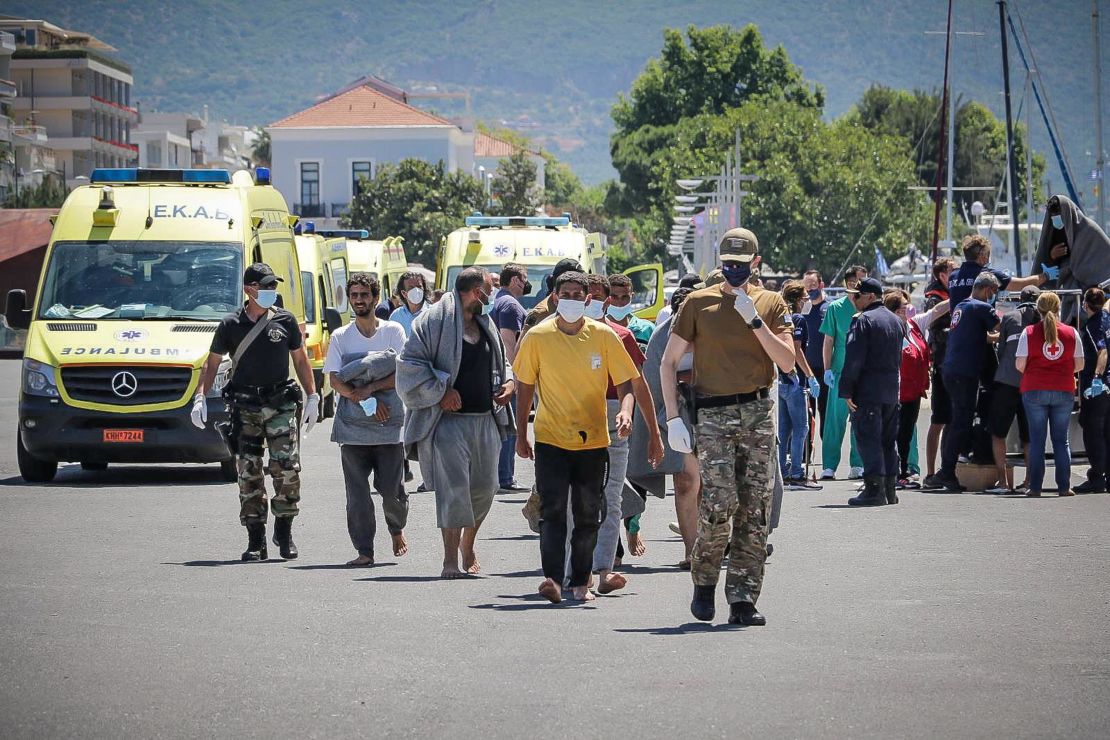 Migrants arrive at the port of Kalamata, following a rescue operation, after their boat capsized at open sea, in Kalamata, Greece, June 14, 2023. 